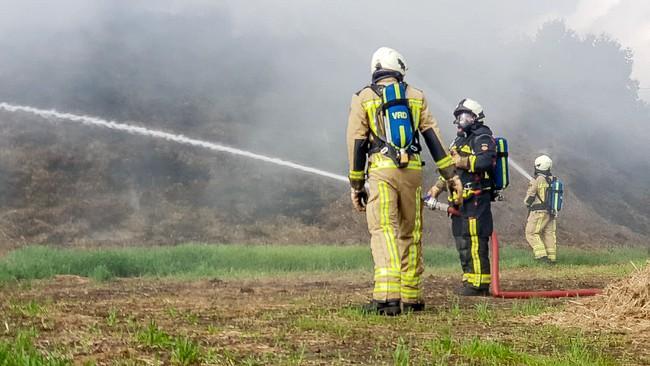 Brand in hooibult in Bunne