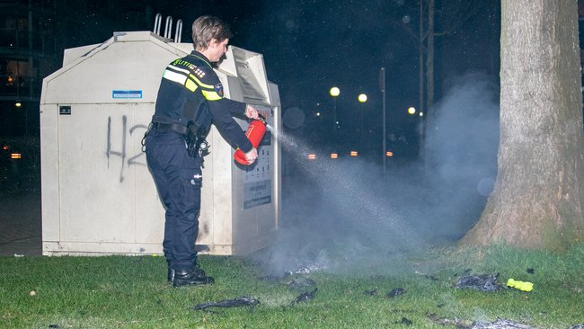 Brand in kledingcontainer bij De Timp