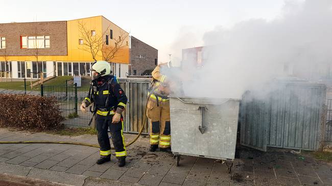 Brandweer blust brand in container 