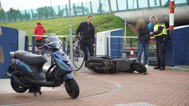 Gewonde bij ongeval tussen twee scooters (Video)