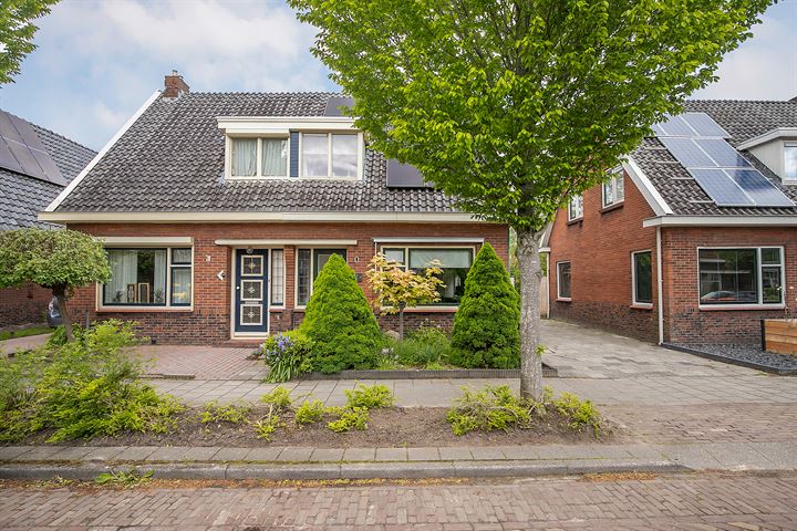 Te koop in Assen: karakteristieke twee-onder-een-kapwoning met dakterras